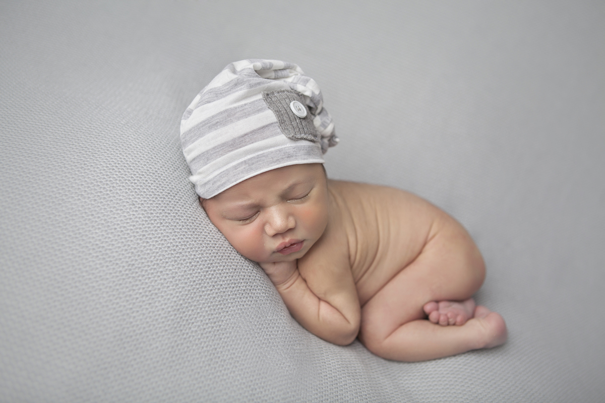 Lauren Jones Photography - Newborn Portraits - Gorgeous boy with striped beanie